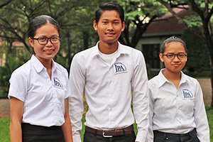 JPA Image Gallery - Three high school students stop for a photo - Jay Pritzker Academy, Siem Reap, Cambodia