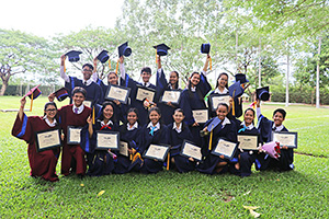 JPA Image Gallery - Class of 2019 celebrate class photo with their diplomas - Jay Pritzker Academy, Siem Reap, Cambodia