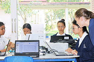 JPA Image Gallery - High school students work on tasks on their laptops - Jay Pritzker Academy, Siem Reap, Cambodia