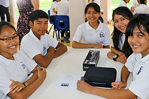 JPA Image Gallery - A group of high school students sit together to engage in a group task - Jay Pritzker Academy, Siem Reap, Cambodia