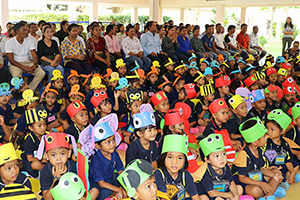 JPA Image Gallery - Parents and kindergarten students sit at assembly - Jay Pritzker Academy, Siem Reap, Cambodia