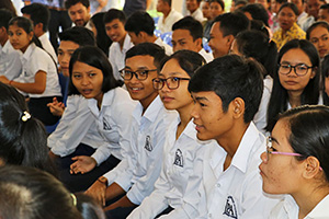 JPA Image Gallery - Seated high school students wait for assembly to begin - Jay Pritzker Academy, Siem Reap, Cambodia