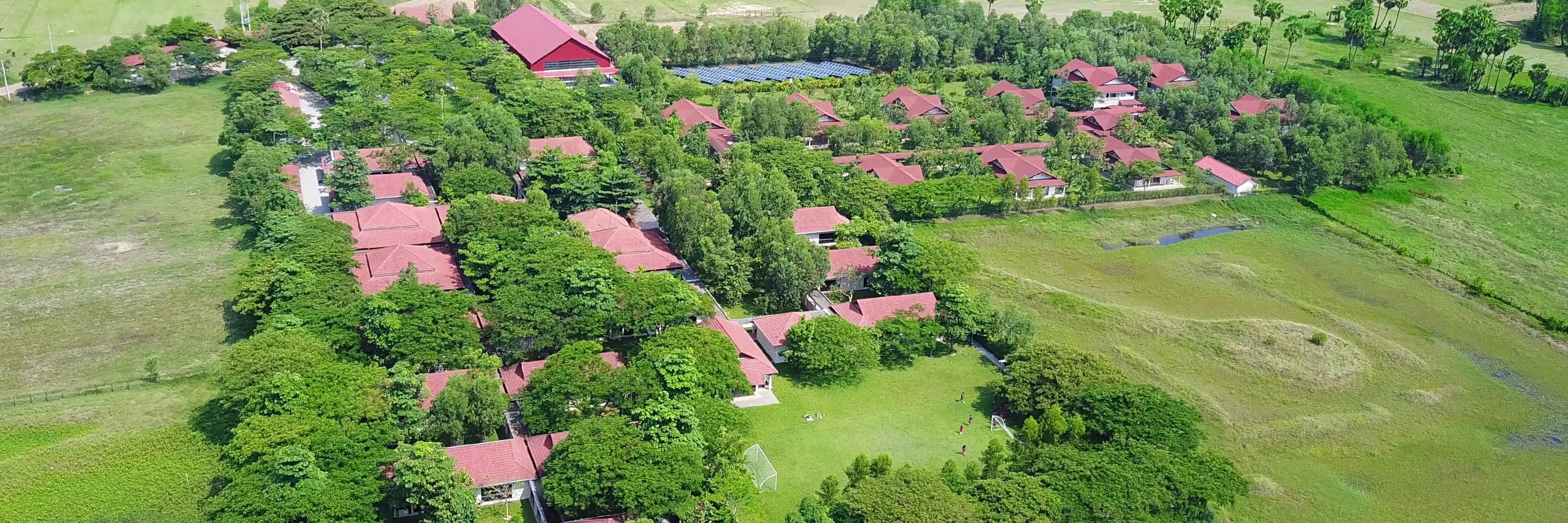 An aerial view of the JPA campus from a drone. Jay Pritzker Academy, Siem Reap, Cambodia. Jay-Pritzker-Academy-Siem-Reap-Cambodia.