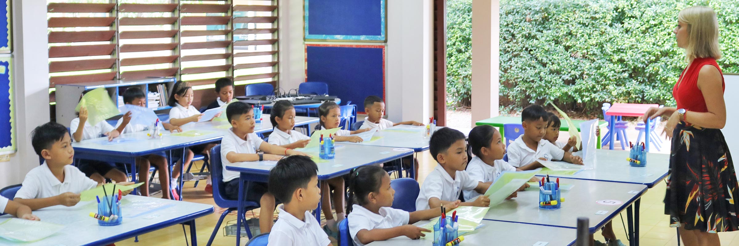 JPA primary school classroom. Grade 3 with their teacher. Jay Pritzker Academy, Siem Reap, Cambodia. Jay-Pritzker-Academy-Siem-Reap-Cambodia.