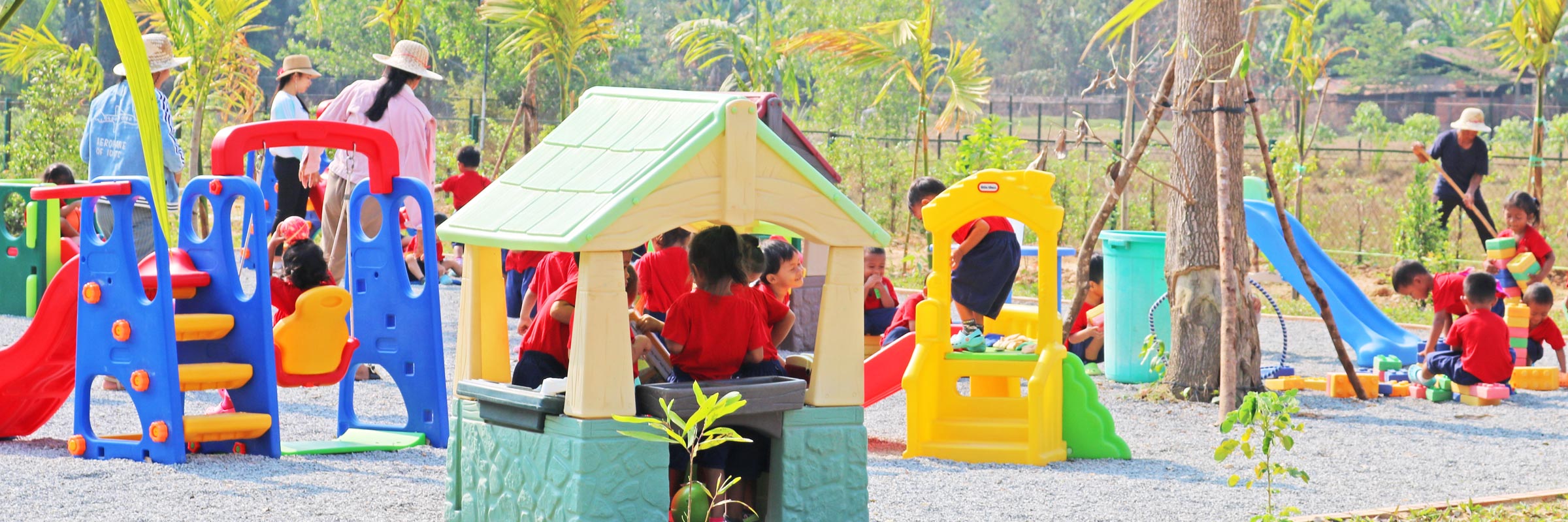 JPA preschool students enjoying the playground equipment. Jay Pritzker Academy, Siem Reap, Cambodia. Jay-Pritzker-Academy-Siem-Reap-Cambodia.