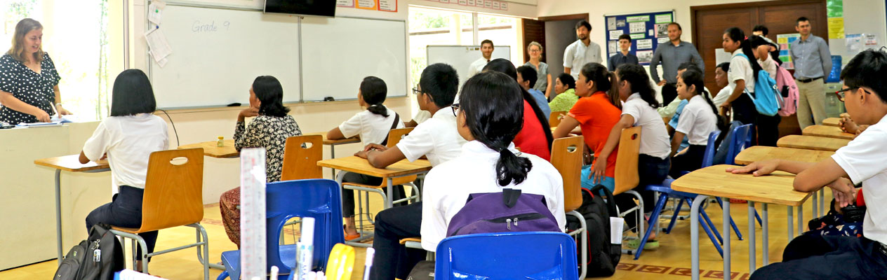 JPA teacher, students and parents in class on the first day of high school - Back to school. Jay Pritzker Academy, Siem Reap, Cambodia. Jay-Pritzker-Academy-Siem-Reap-Cambodia.