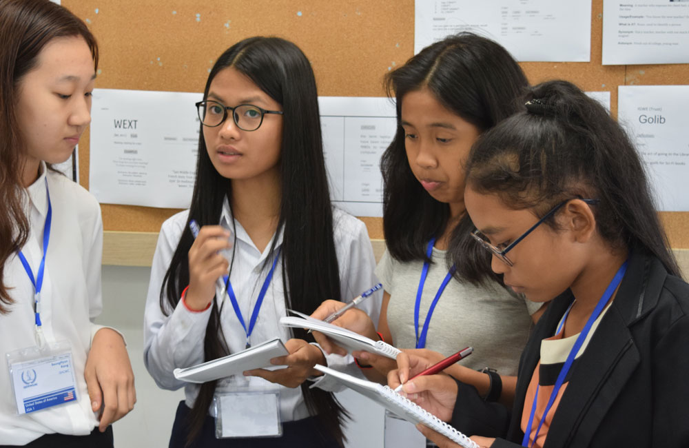 JPA Students Thida, Lin, Sokuntheary from the Model United Nations (MUN) class who participated in the MUN conference at the International School of Phnom Penh. Jay Pritzker Academy, Siem Reap, Cambodia. Jay-Pritzker-Academy-Siem-Reap-Cambodia.