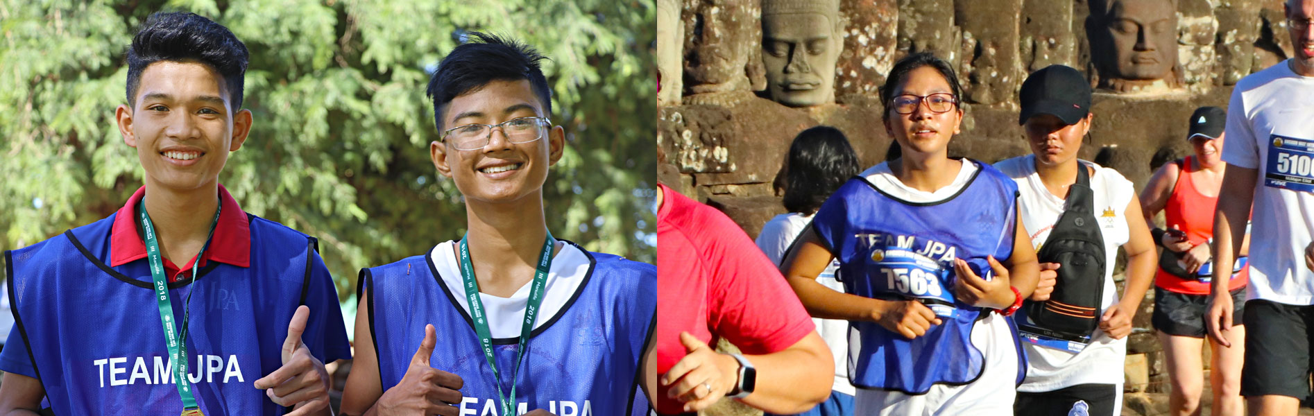 JPA students who ran the fastest times running in the Angkor Wat Half Marathon - Sothea, Khemara, and Alisa. Jay Pritzker Academy, Siem Reap, Cambodia. Jay-Pritzker-Academy-Siem-Reap-Cambodia.
