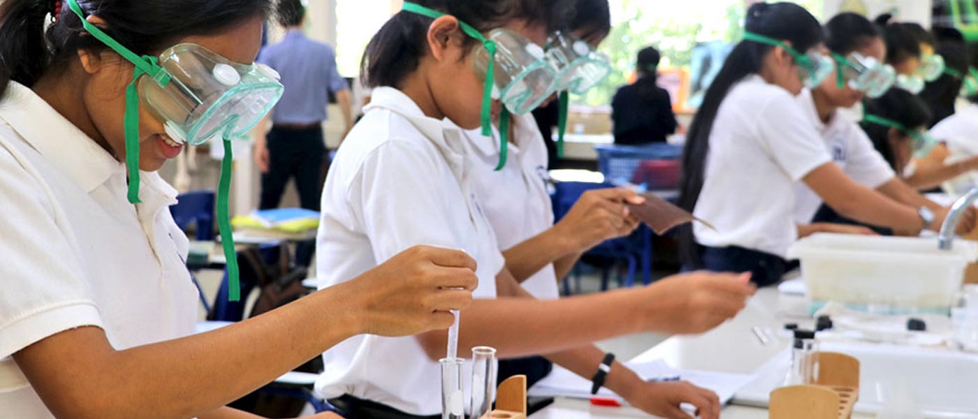 JPA students using chemicals for experiments in the laborotory. Jay Pritzker Academy, Siem Reap, Cambodia. Jay-Pritzker-Academy-Siem-Reap-Cambodia.
